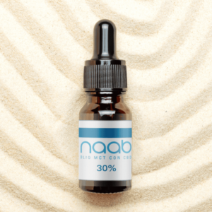 olio cbd 30% naab con sfondo sabbioso